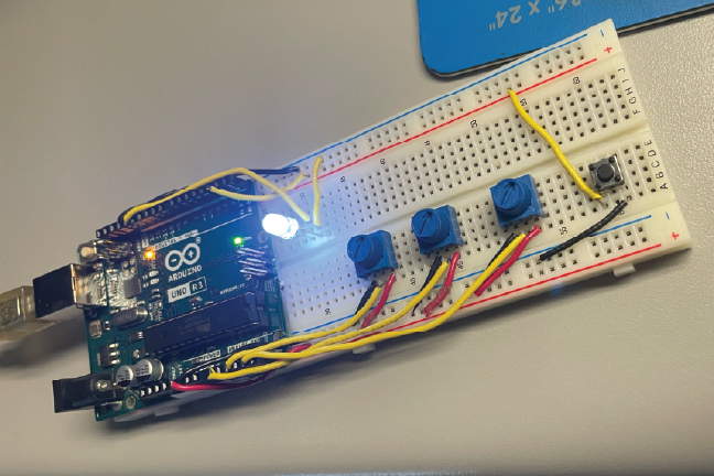 In the Arduino code, I made it so that the first two Potnometers controled the Touch Designer graphic while the third one and the button controled a light.
